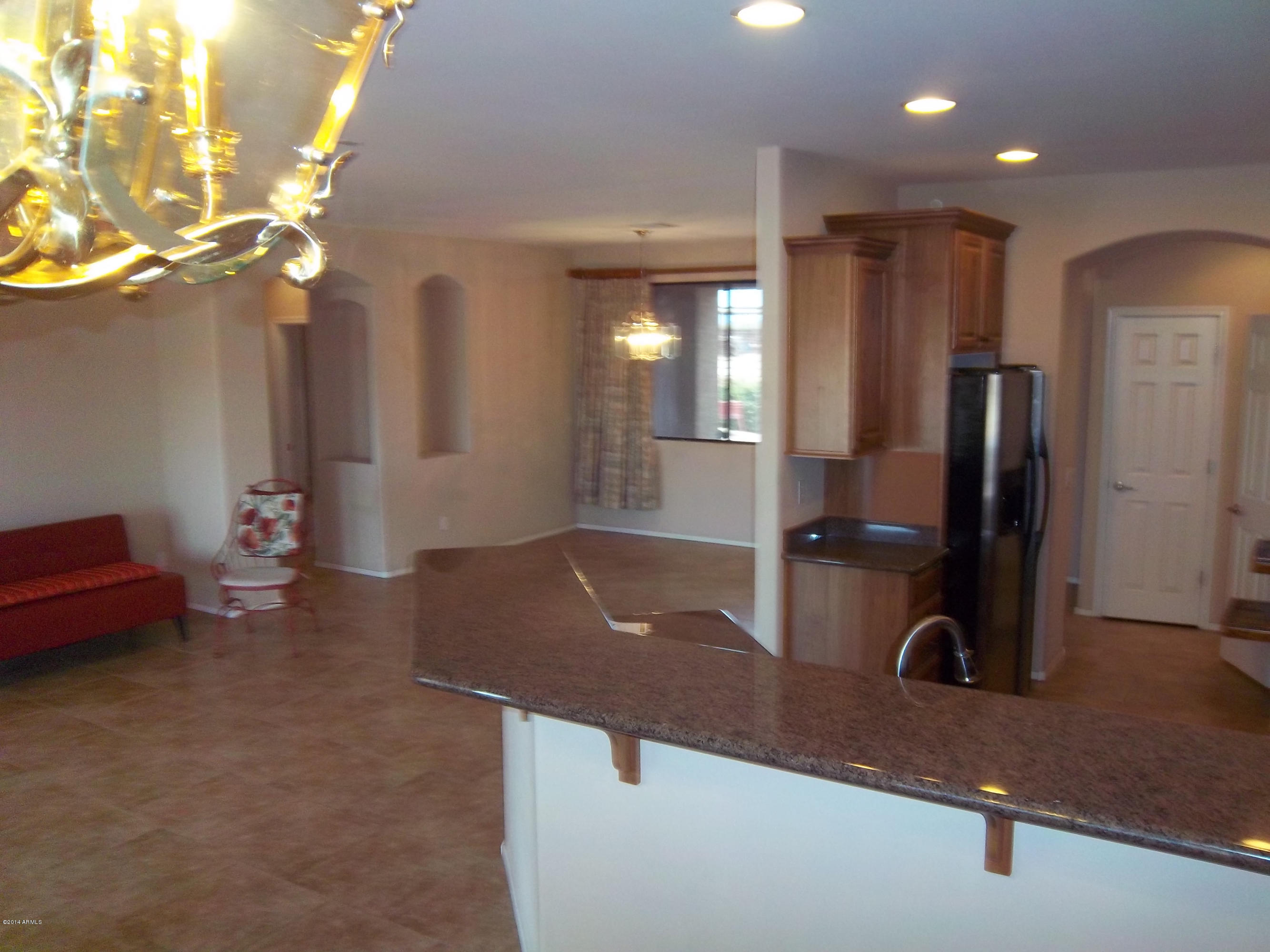21117 West Steedridge Road Wittmann, AZ 85361 - Photo 6 of 66 Dinette to Dining room