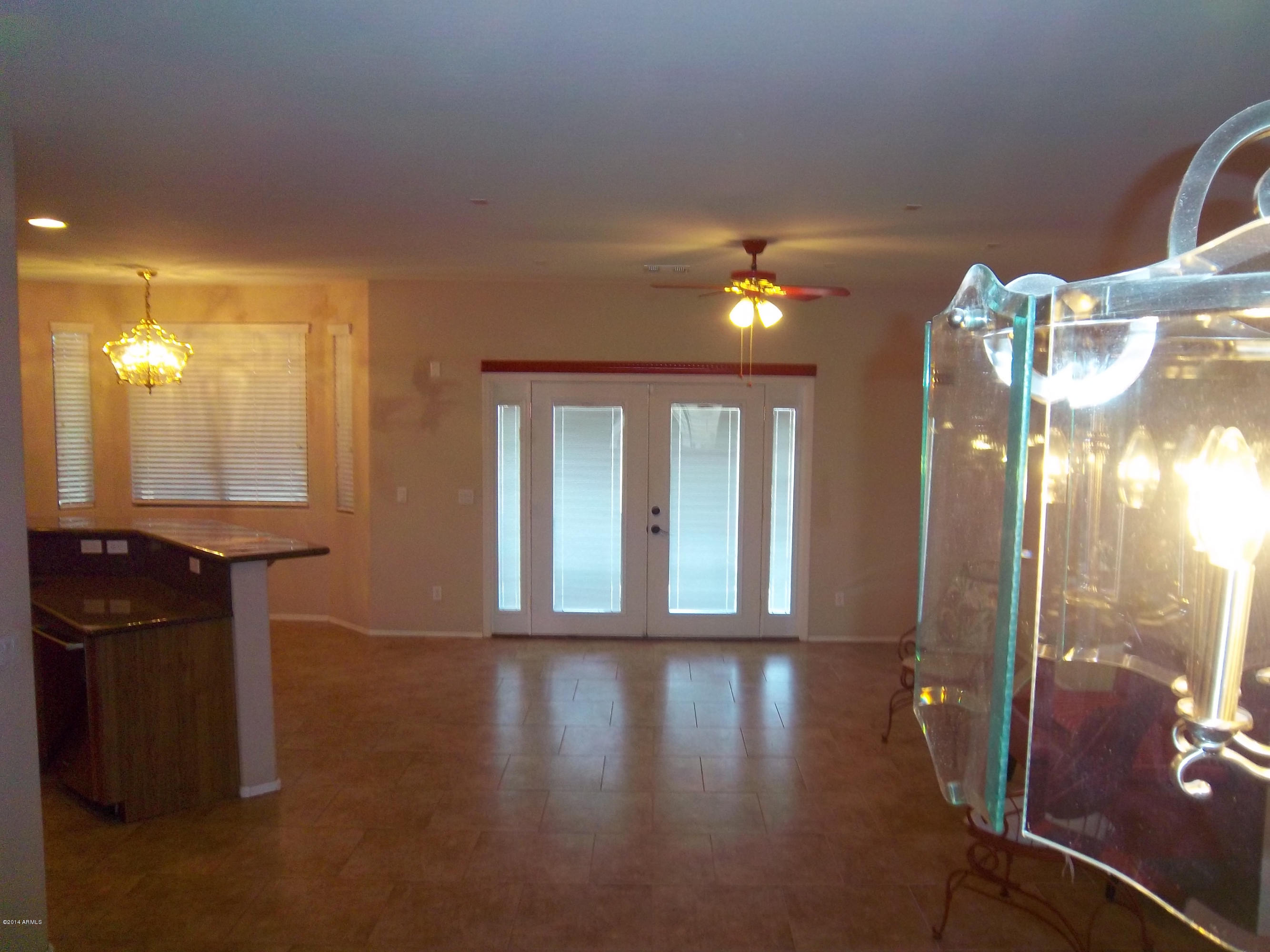 21117 West Steedridge Road Wittmann, AZ 85361 - Photo 61 of 66 Greatroom with French Doors