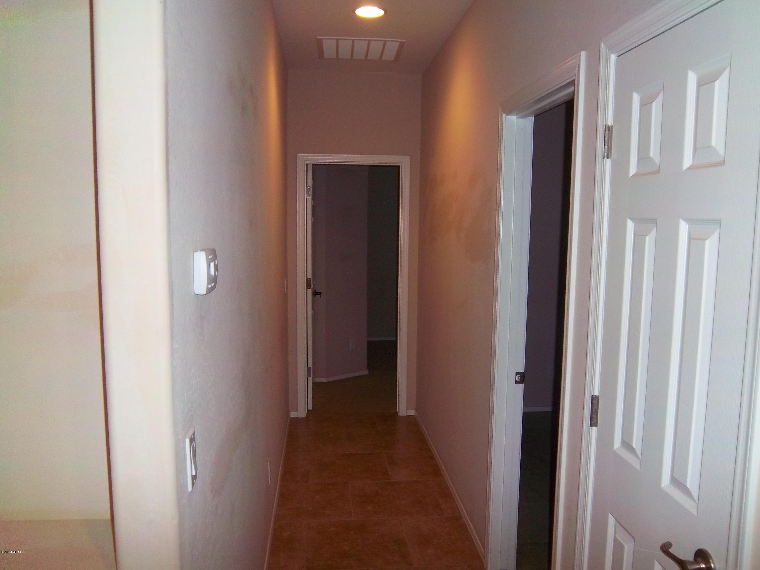 21117 West Steedridge Road Wittmann, AZ 85361 - Photo 63 of 66 Six panel doors everywhere