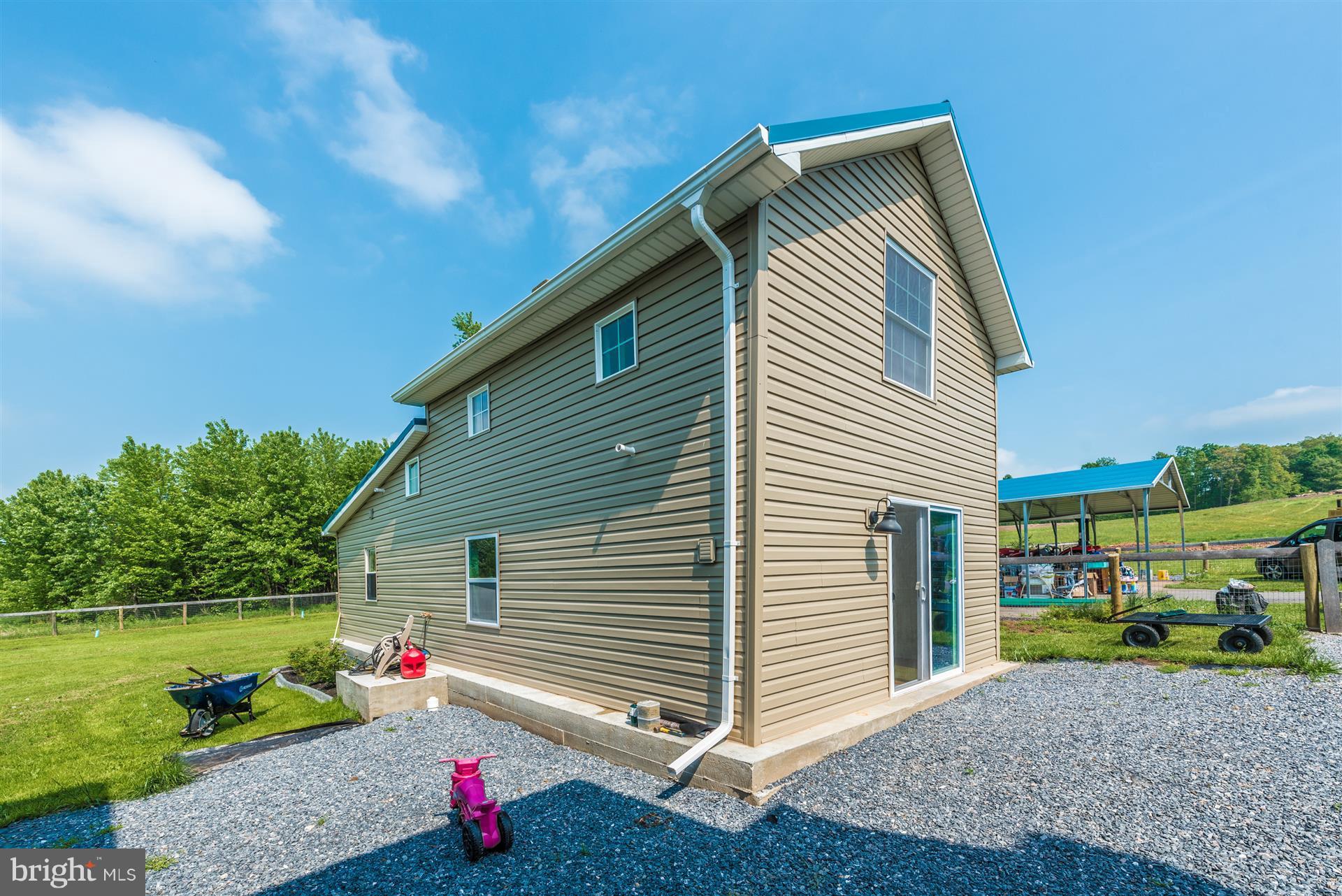 11849 Cash Smith Road Keymar, MD 21757 - Photo 22 of 30 a view of a house with a yard