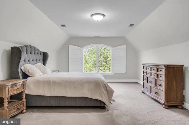 a view of a garage with storage and utility