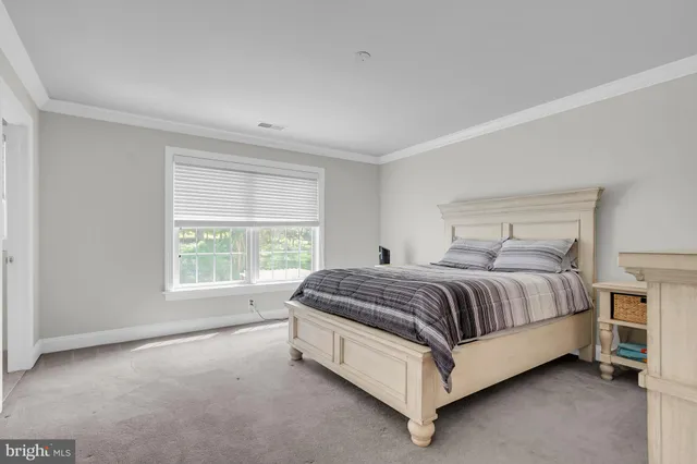 a view of room with a large window and outdoor kitchen