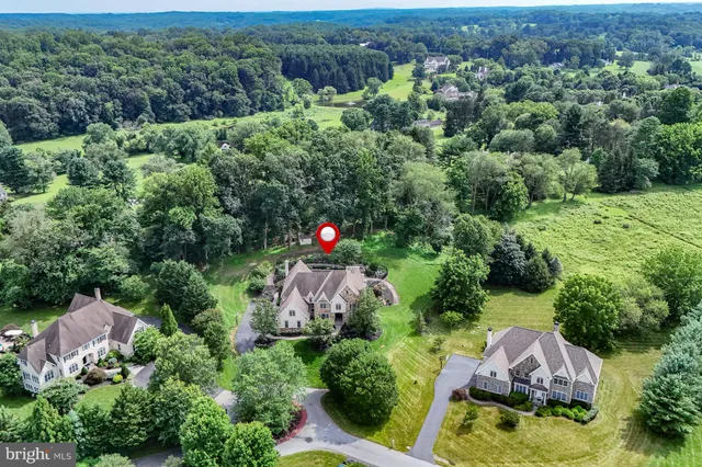 a picture of a bench in front of a gate