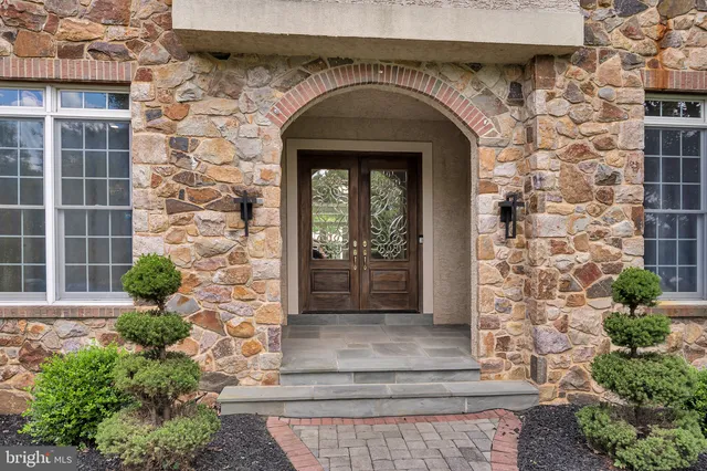 a view of livingroom with furniture wooden floor and windows