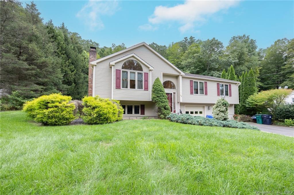 89 Squantuck Road Seymour, CT 06483 - Photo 1 of 1 a view of a house with a yard and sitting area