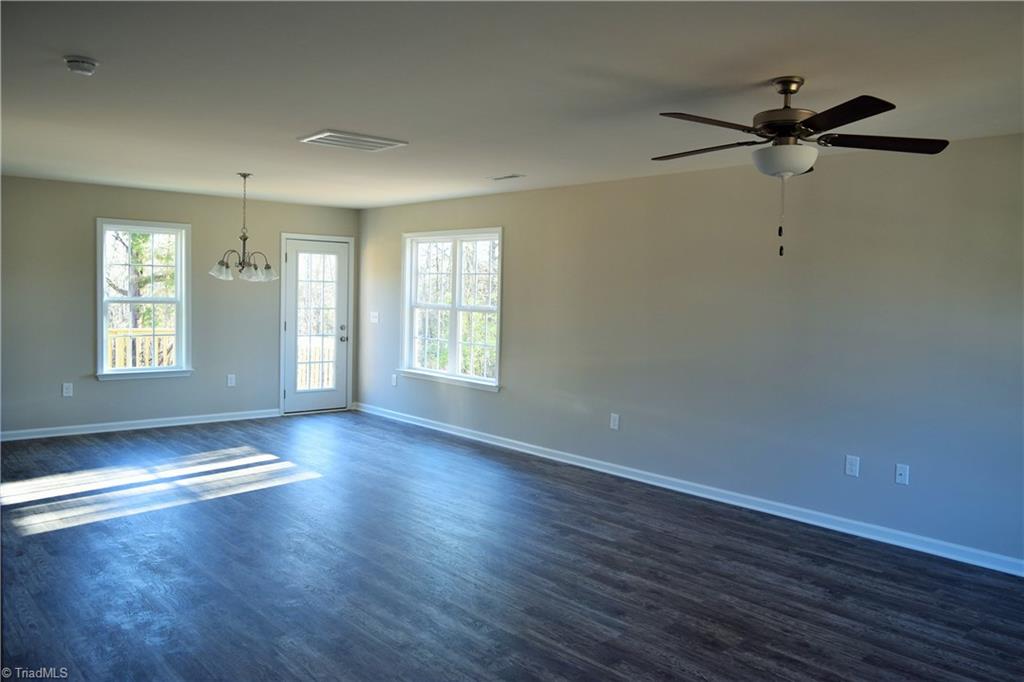 951 Eden Church Road Madison, NC 27025 - Photo 4 of 28 Open living room and dining room