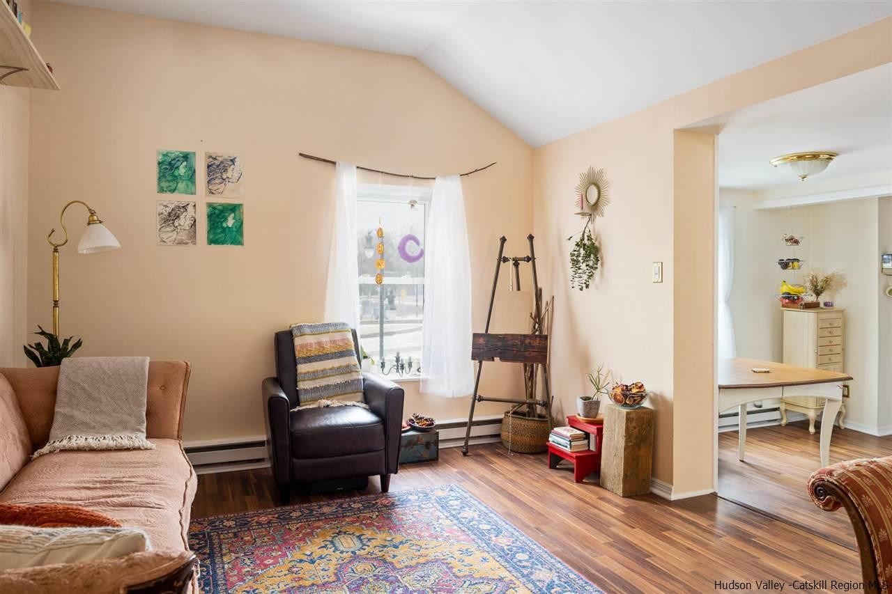 744-746 Broadway Kingston, NY 12401 - Photo 15 of 28 a living room with furniture and wooden floor
