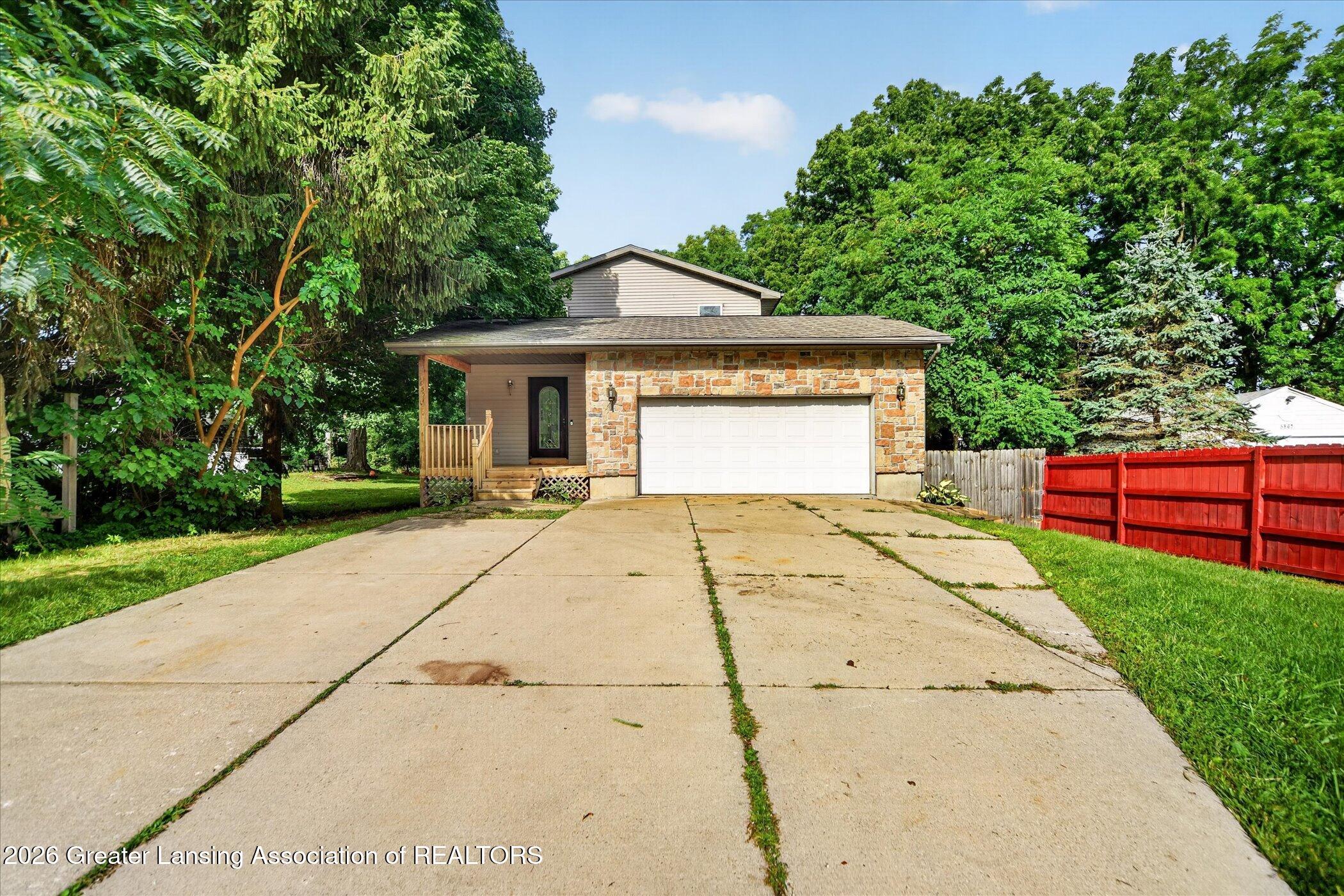 5855 Edson Street Haslett, MI 48840 - Photo 2 of 38 03-5855-Edson-St-WindowStill