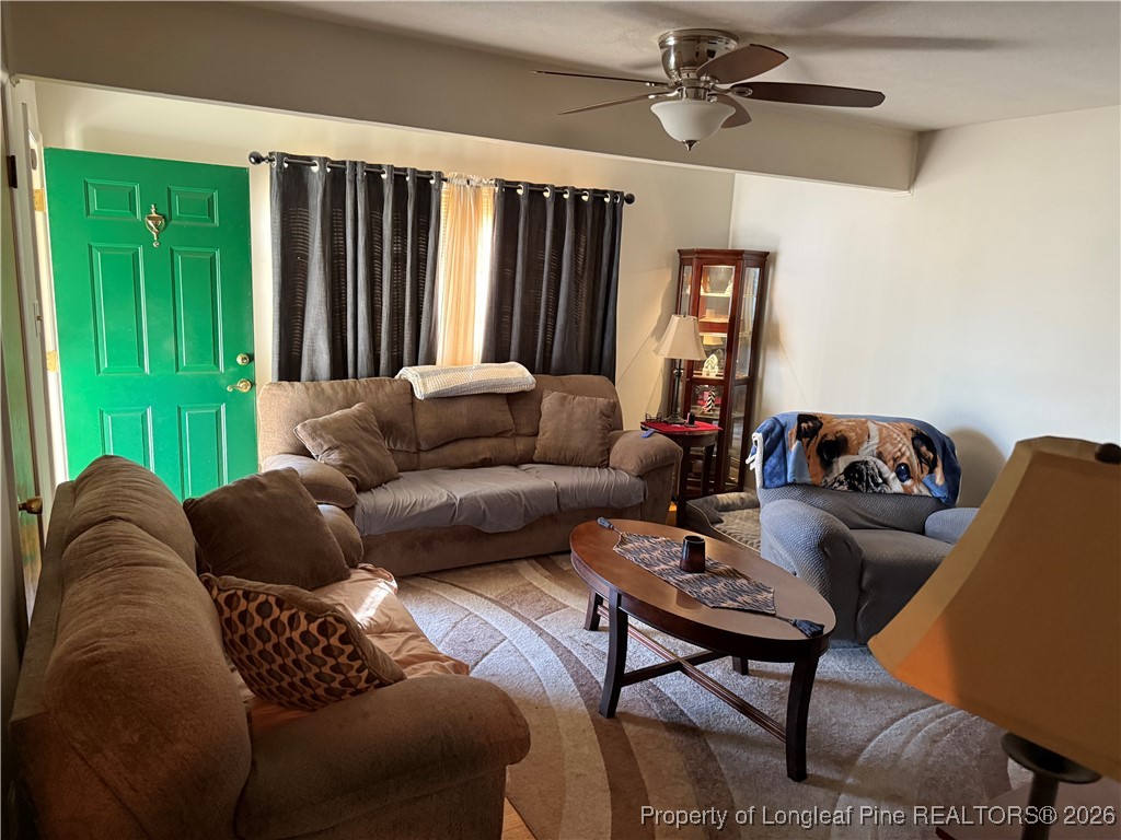 655 Wiltshire Road Fayetteville, NC 28314 - Photo 2 of 17 a living room with furniture and a window