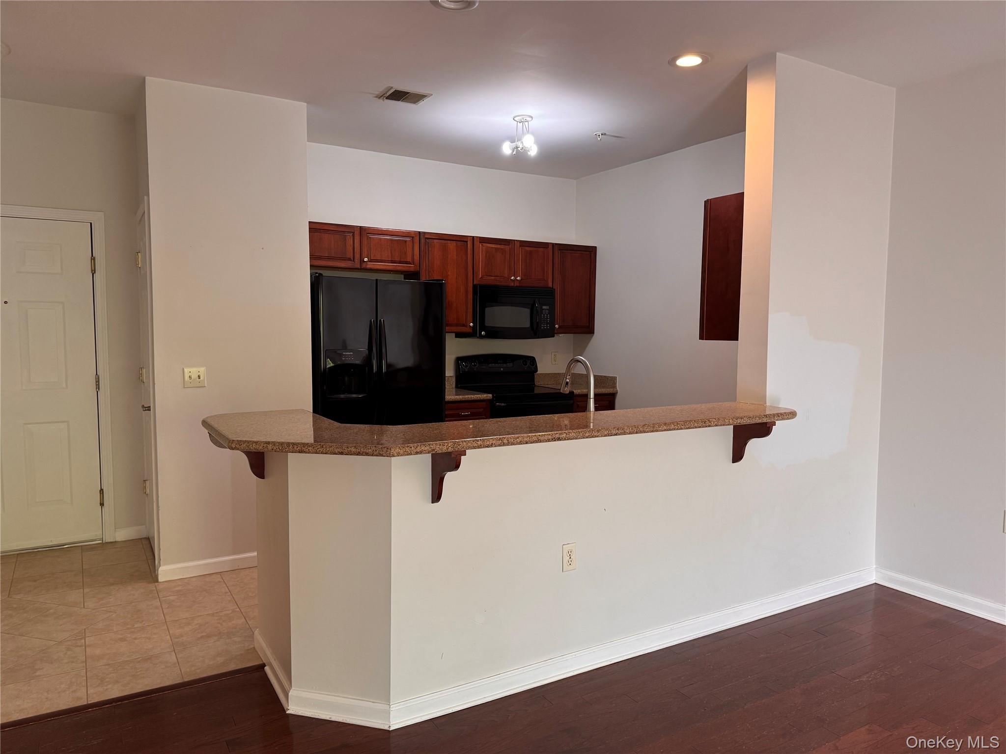 935 Tower Ridge Circle Middletown, NY 10941 - Photo 11 of 23 a living room with furniture and a flat screen tv