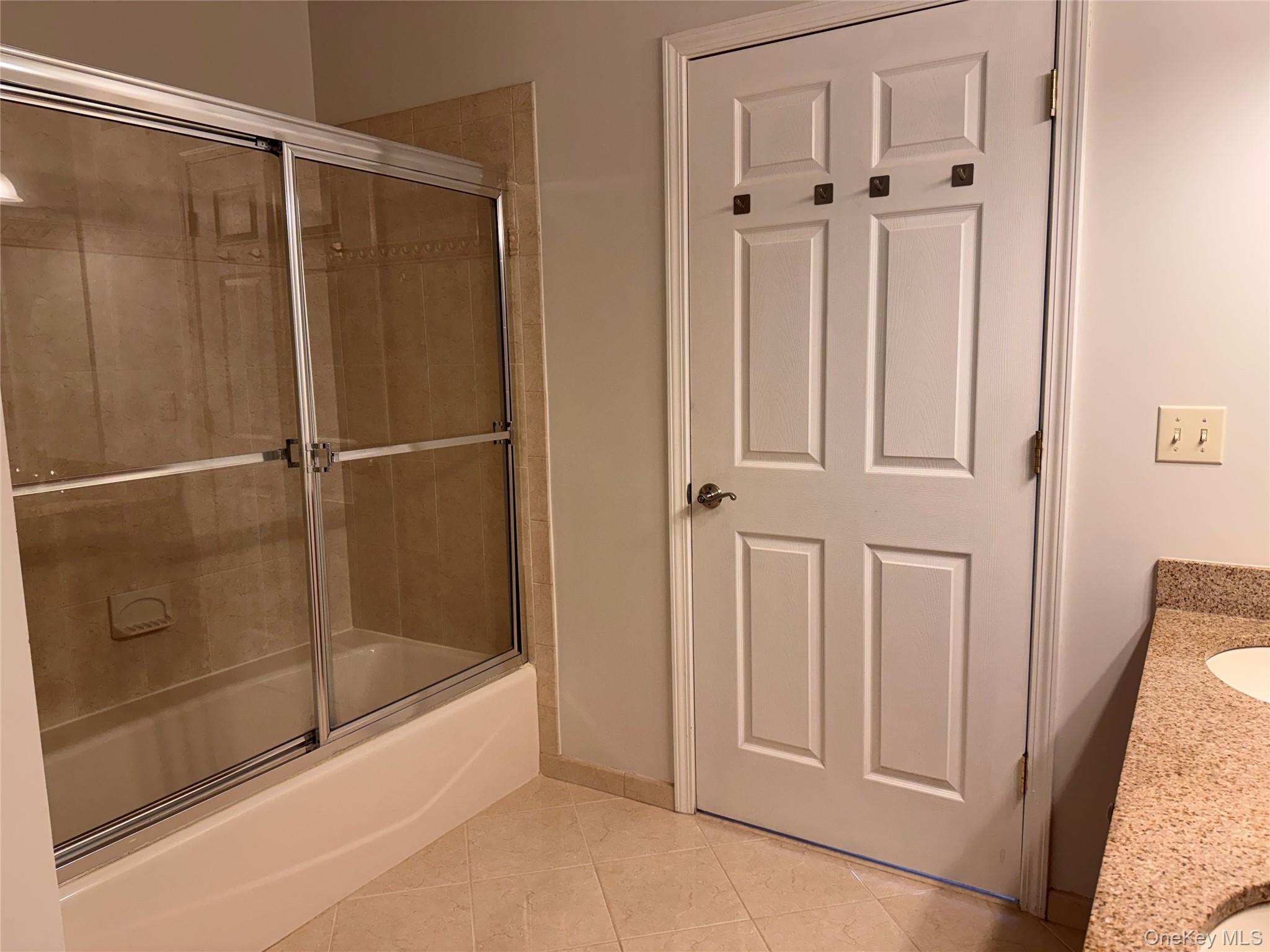 935 Tower Ridge Circle Middletown, NY 10941 - Photo 17 of 23 a bathroom with a bathtub