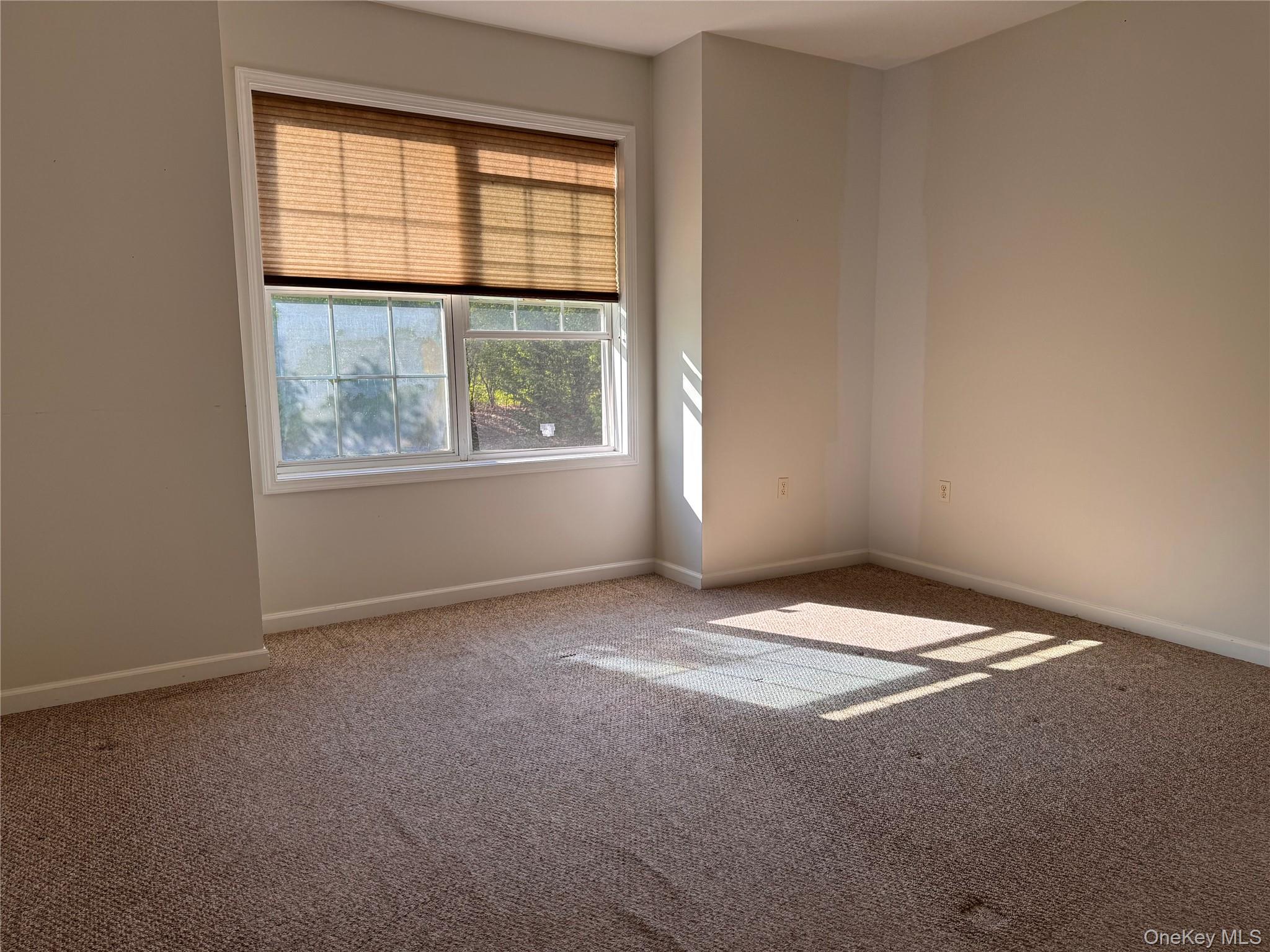 935 Tower Ridge Circle Middletown, NY 10941 - Photo 19 of 23 an empty room with windows