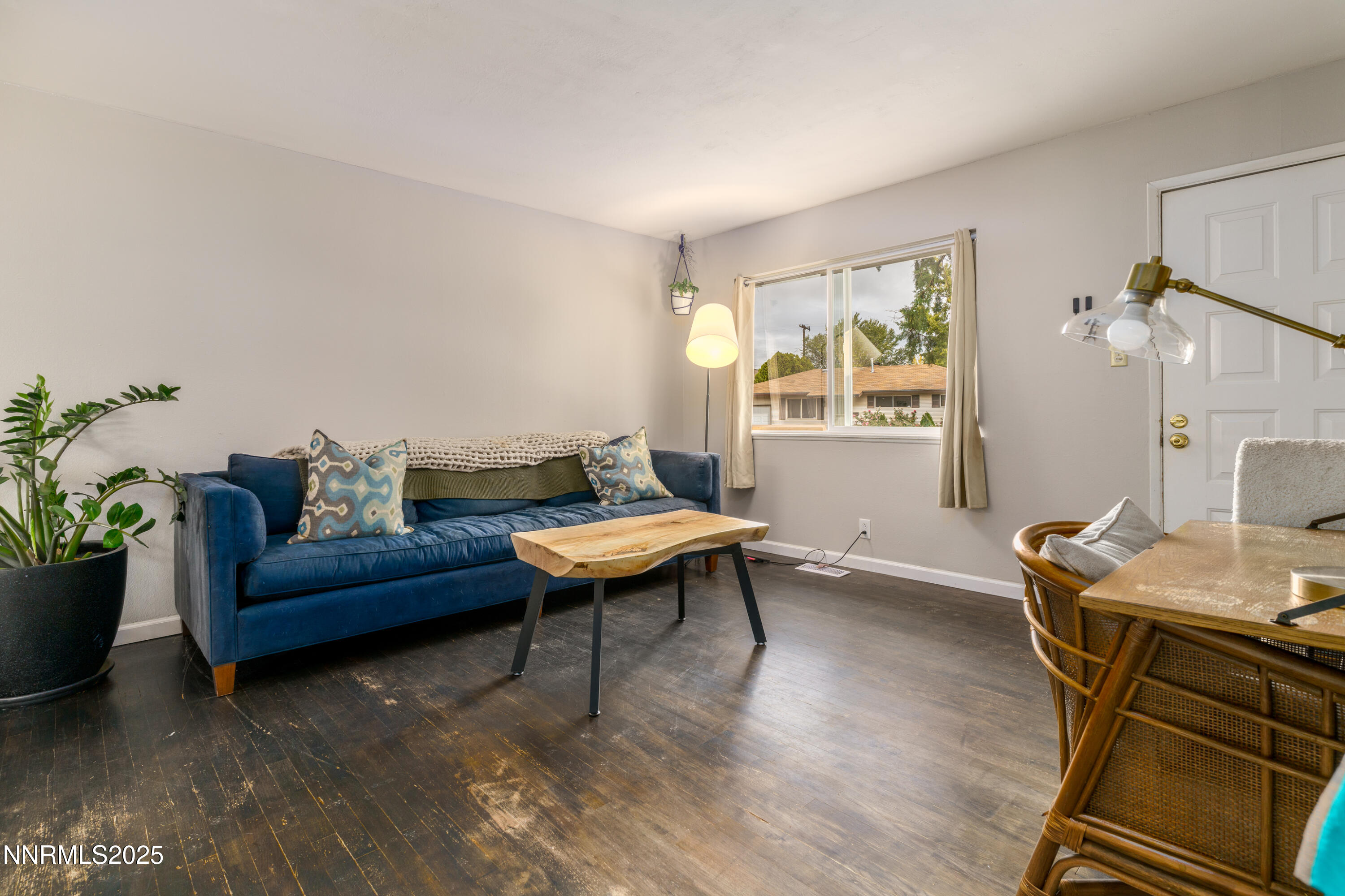 995 Beldon Way Reno, NV 89503 - Photo 3 of 17 a living room with furniture a table and a potted plant