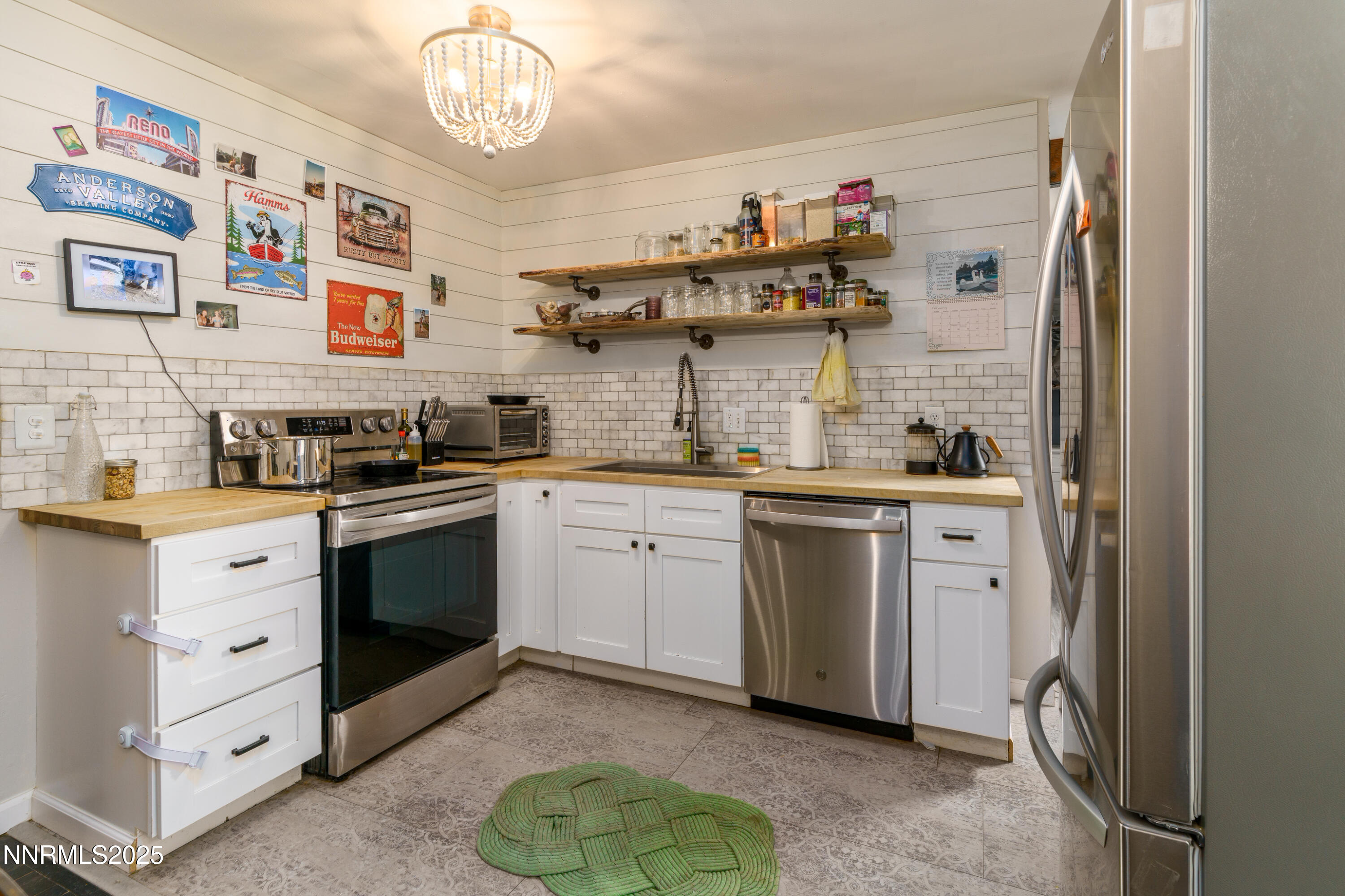 995 Beldon Way Reno, NV 89503 - Photo 7 of 17 a kitchen with cabinets appliances and a counter