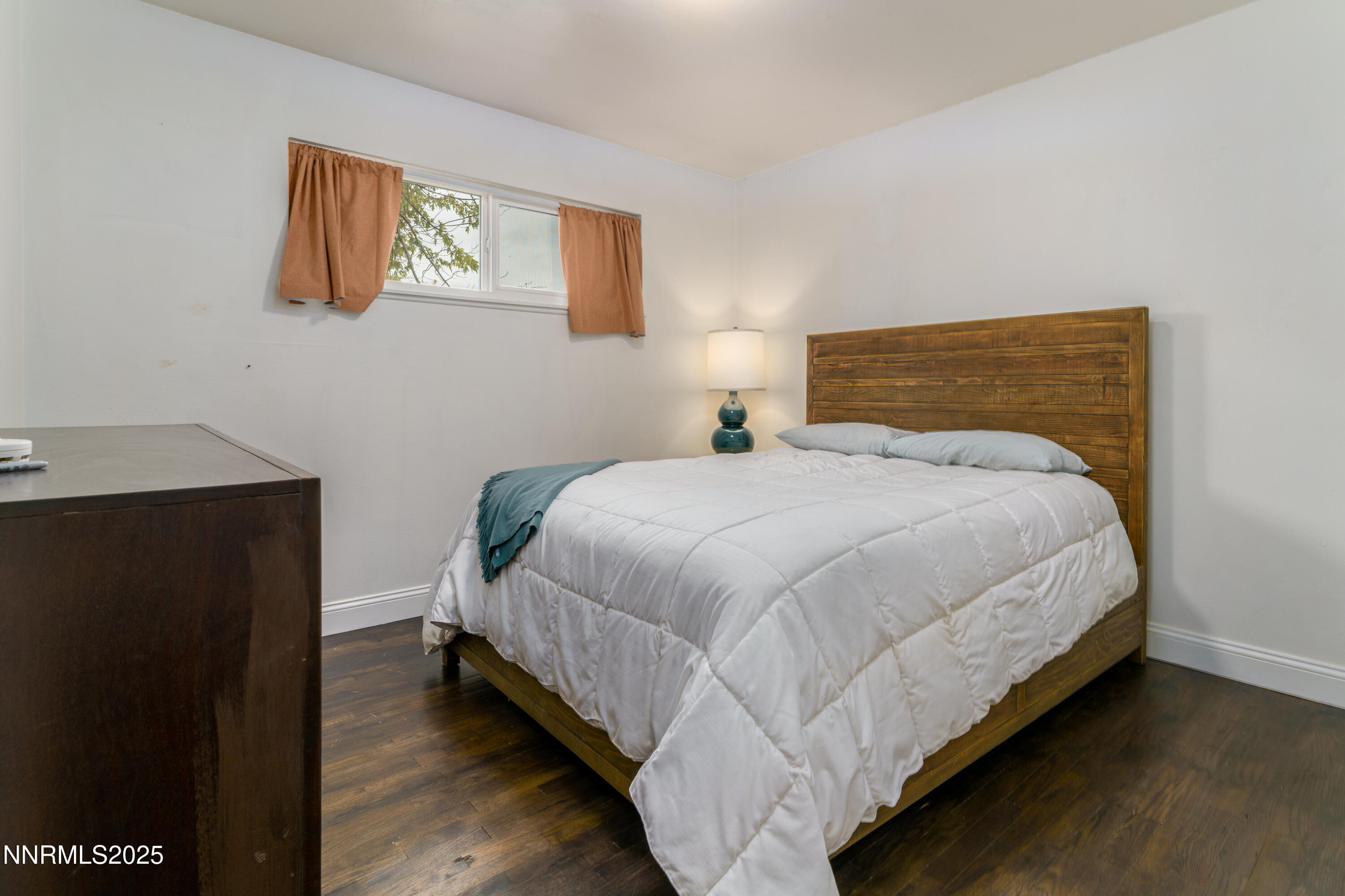995 Beldon Way Reno, NV 89503 - Photo 9 of 17 a bedroom with a bed and wooden floor