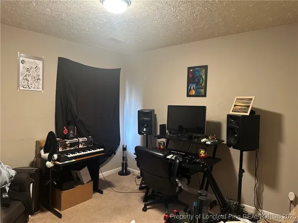 a room with furniture and wooden floor