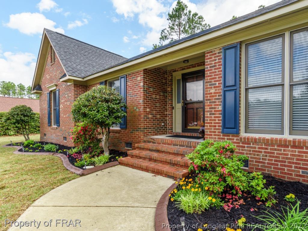 7790 Dragonhead Road Fayetteville, NC 28311 - Photo 4 of 36 front view of a house