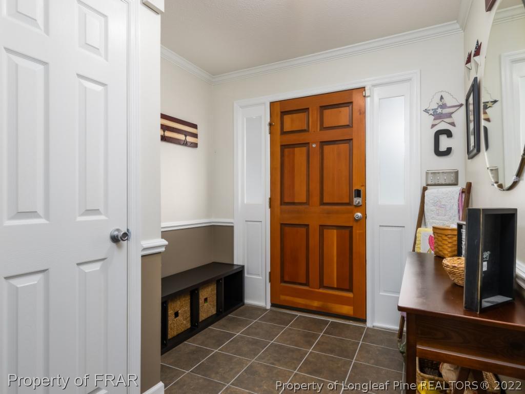 7790 Dragonhead Road Fayetteville, NC 28311 - Photo 9 of 36 a view of an entryway with furniture