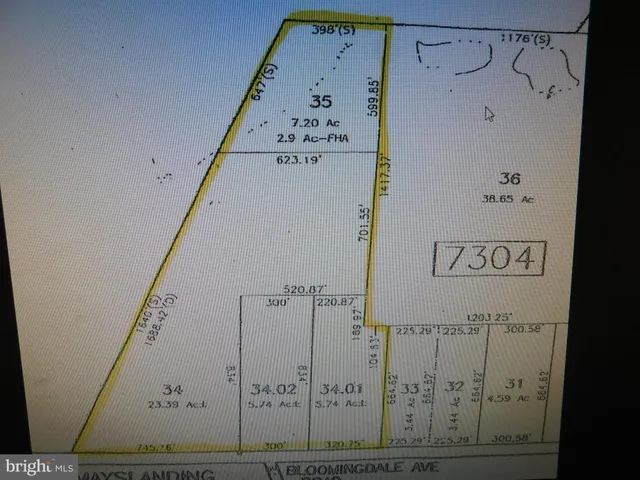 a view of a hallway with wooden door