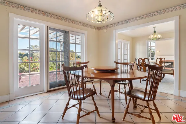a bedroom with a bed and a fireplace