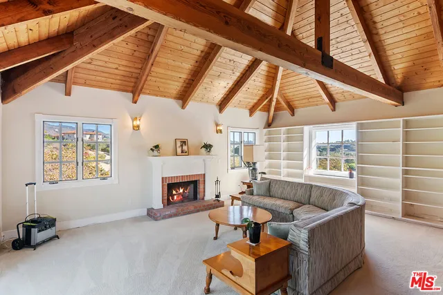 an aerial view of residential house and green space