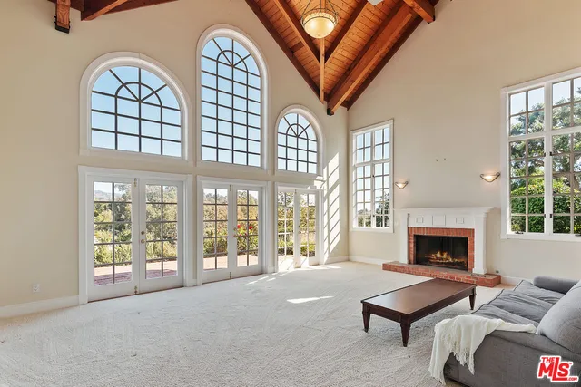 a kitchen with stainless steel appliances granite countertop cabinets and window