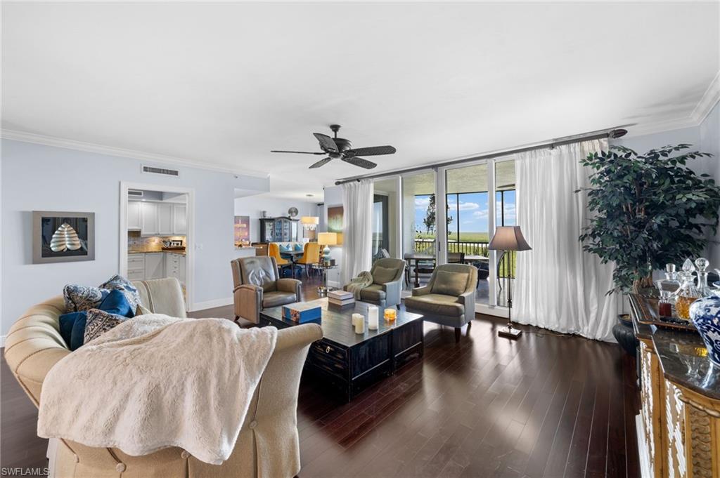 1050 Borghese Lane, Unit 902 Naples, FL 34114 - Photo 11 of 50 Living room with ornamental molding, french doors, dark hardwood / wood-style flooring, and ceiling fan