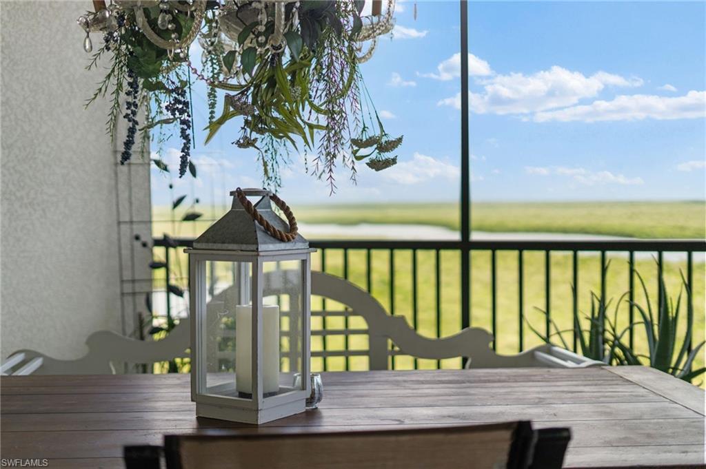 1050 Borghese Lane, Unit 902 Naples, FL 34114 - Photo 37 of 50 View of wooden terrace