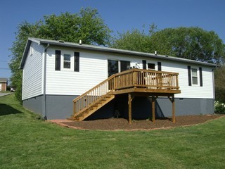 1126 Ross Road Vinton, VA 24179 - Photo 2 of 13 a view of a house with a yard