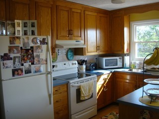 1126 Ross Road Vinton, VA 24179 - Photo 4 of 13 a kitchen with stainless steel appliances a stove a sink and a cabinets