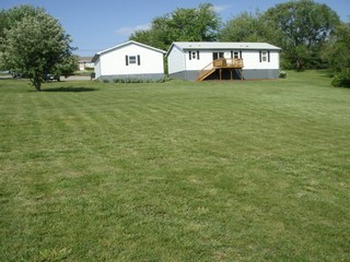 1126 Ross Road Vinton, VA 24179 - Photo 7 of 13 a house view with a garden space