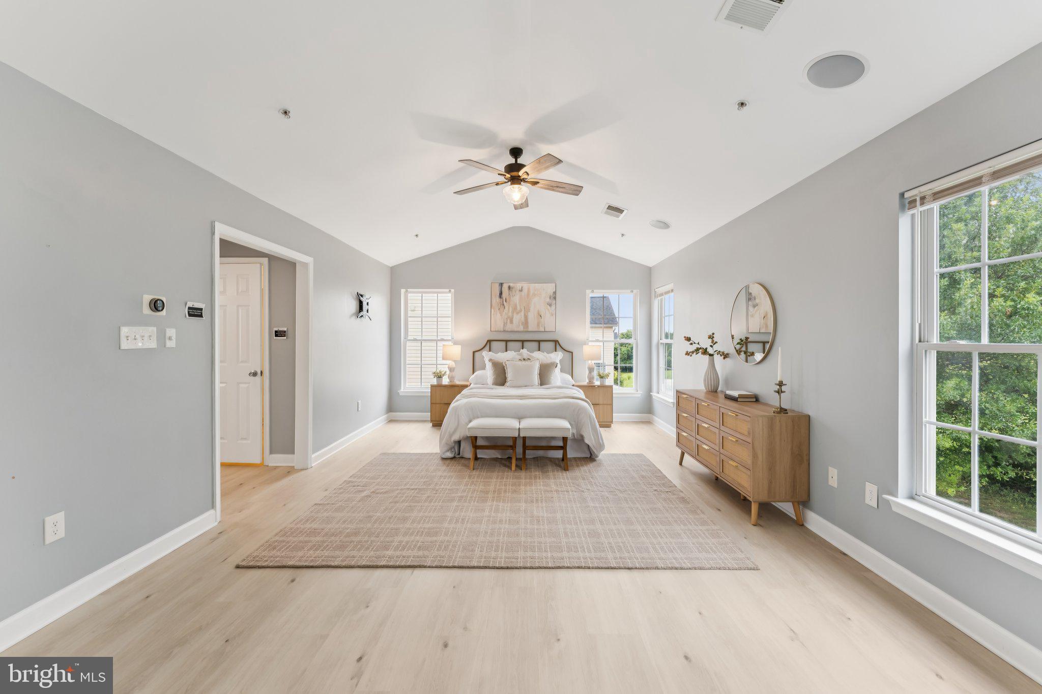 14520 Fairdale Road Silver Spring, MD 20905 - Photo 15 of 50 a bedroom with a bed and a large window