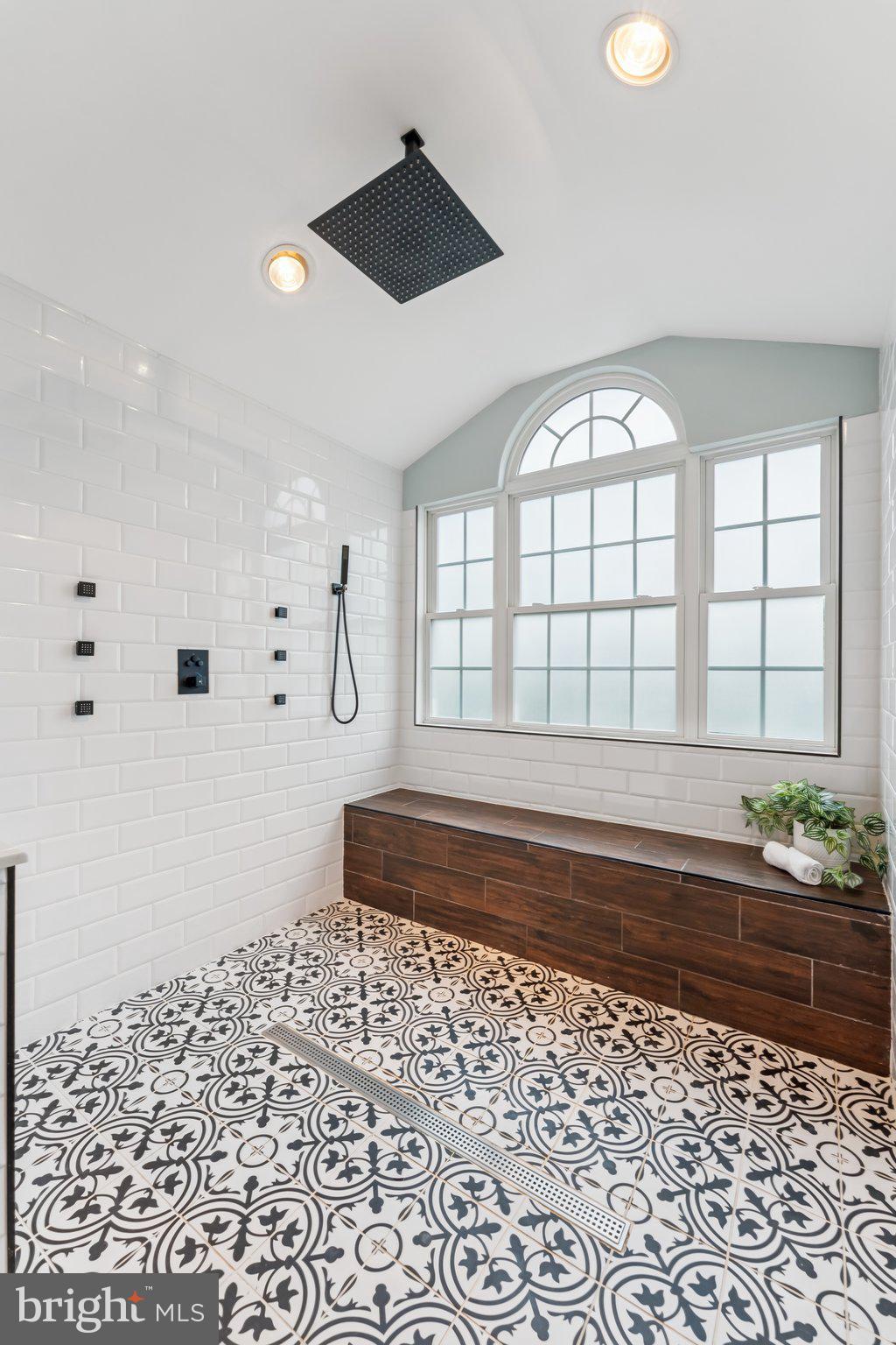 14520 Fairdale Road Silver Spring, MD 20905 - Photo 20 of 50 a bathroom with a bathtub and a shower