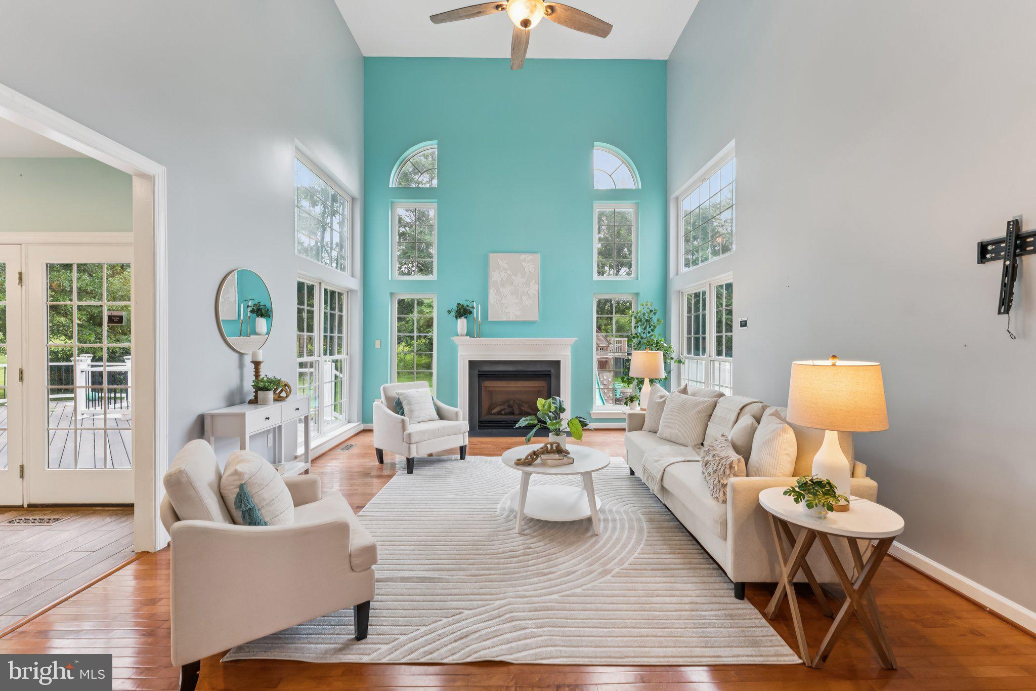 14520 Fairdale Road Silver Spring, MD 20905 - Photo 2 of 50 a living room with furniture and a fireplace