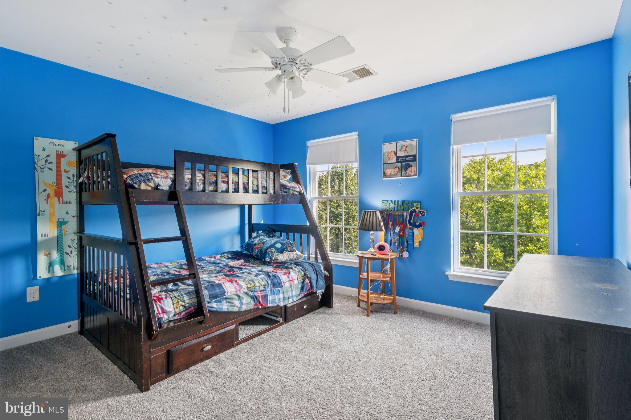 14520 Fairdale Road Silver Spring, MD 20905 - Photo 25 of 50 a bedroom with two beds and a window