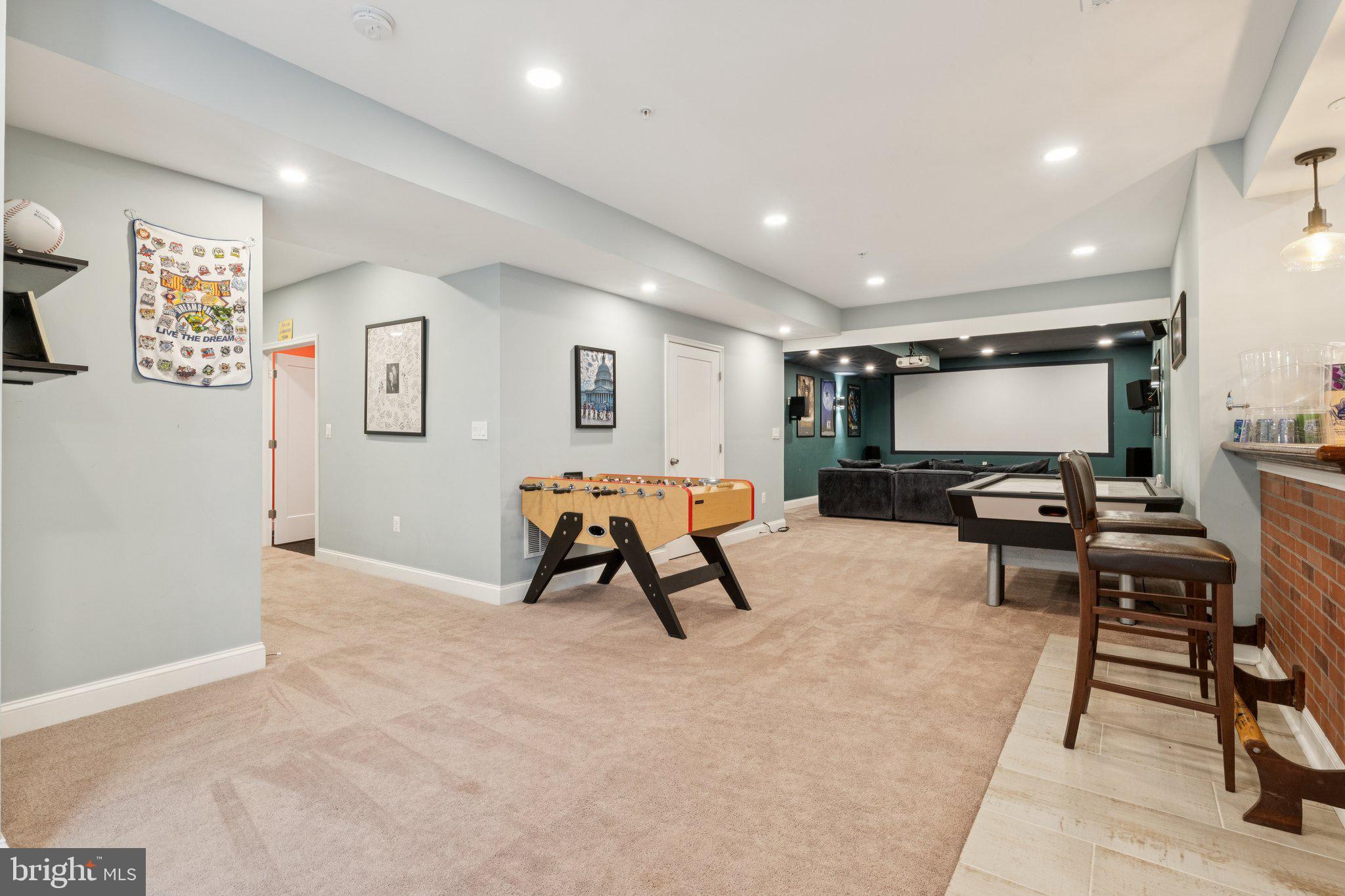 14520 Fairdale Road Silver Spring, MD 20905 - Photo 34 of 50 a living room with furniture and a flat screen tv