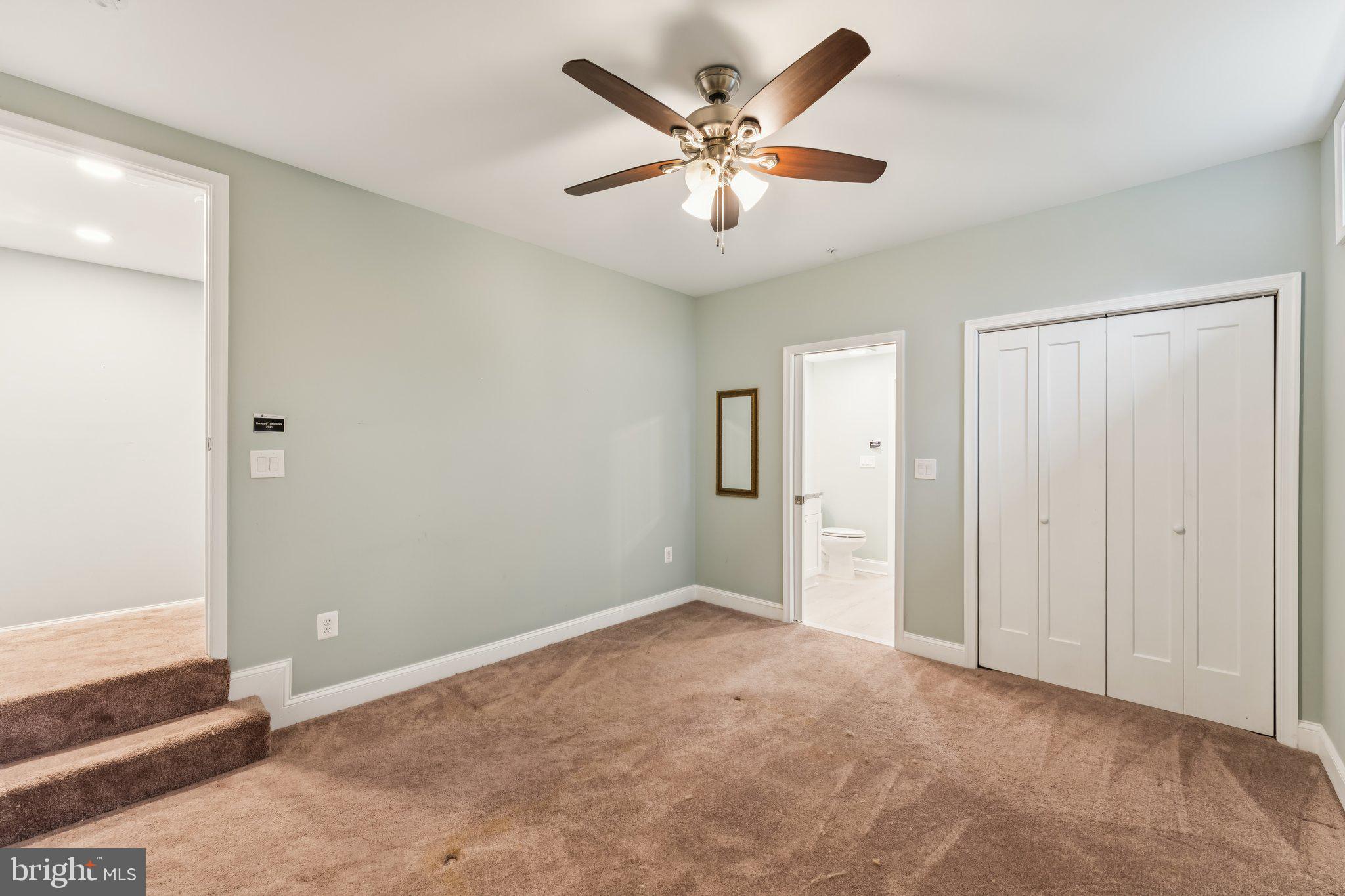 14520 Fairdale Road Silver Spring, MD 20905 - Photo 37 of 50 an empty room with closet and a ceiling fan