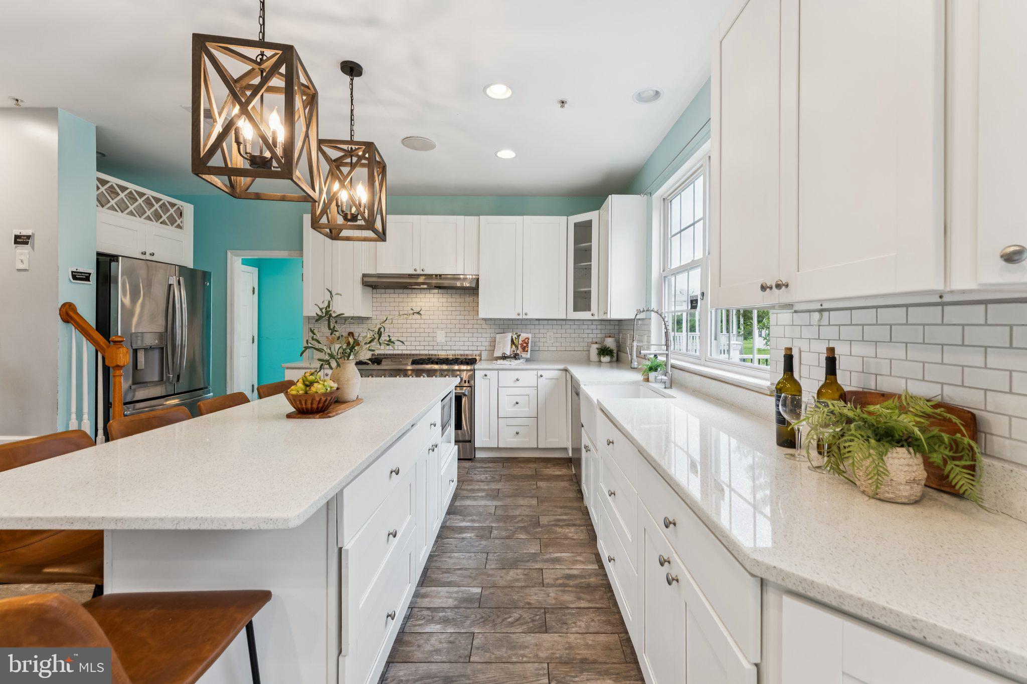 14520 Fairdale Road Silver Spring, MD 20905 - Photo 4 of 50 a kitchen with cabinets a sink and stainless steel appliances