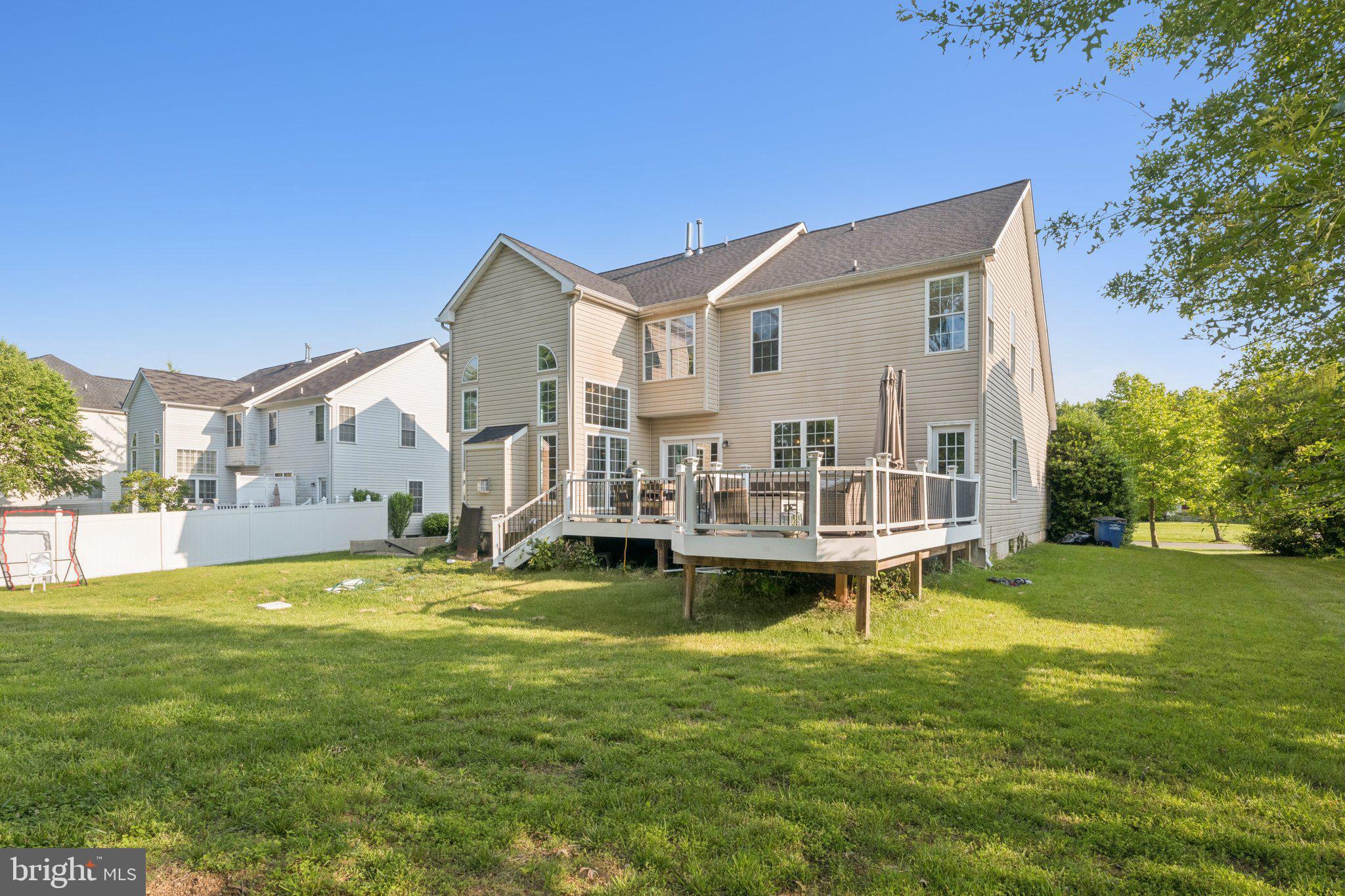 14520 Fairdale Road Silver Spring, MD 20905 - Photo 45 of 50 a view of a house with a big yard and large trees