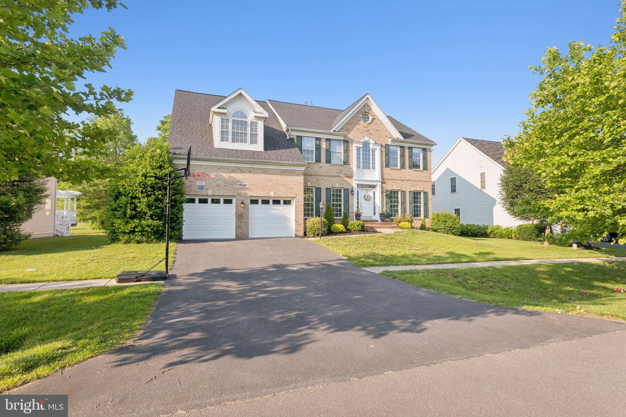 14520 Fairdale Road Silver Spring, MD 20905 - Photo 50 of 50 a front view of a house with a yard