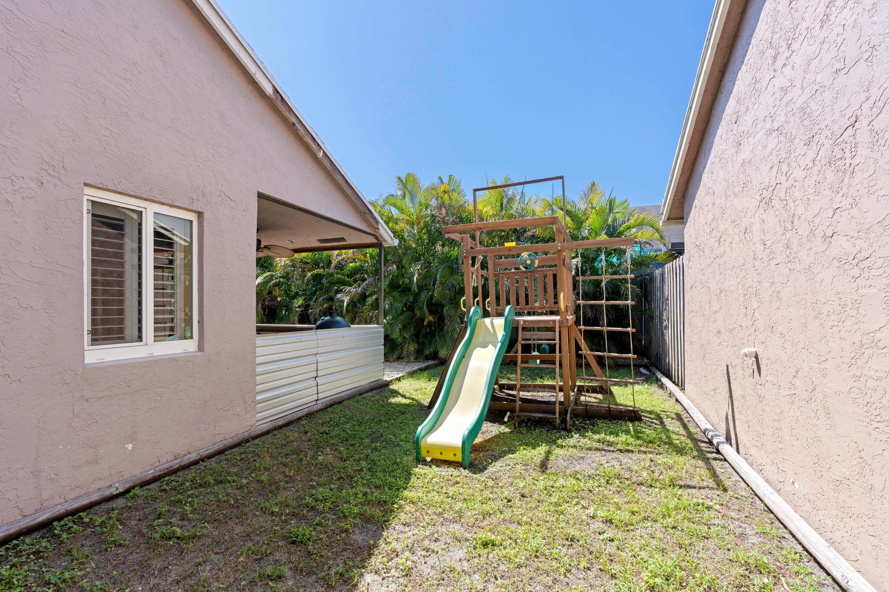 8584 Shawe Way Boca Raton, FL 33433 - Photo 19 of 43 a view of a backyard with plants
