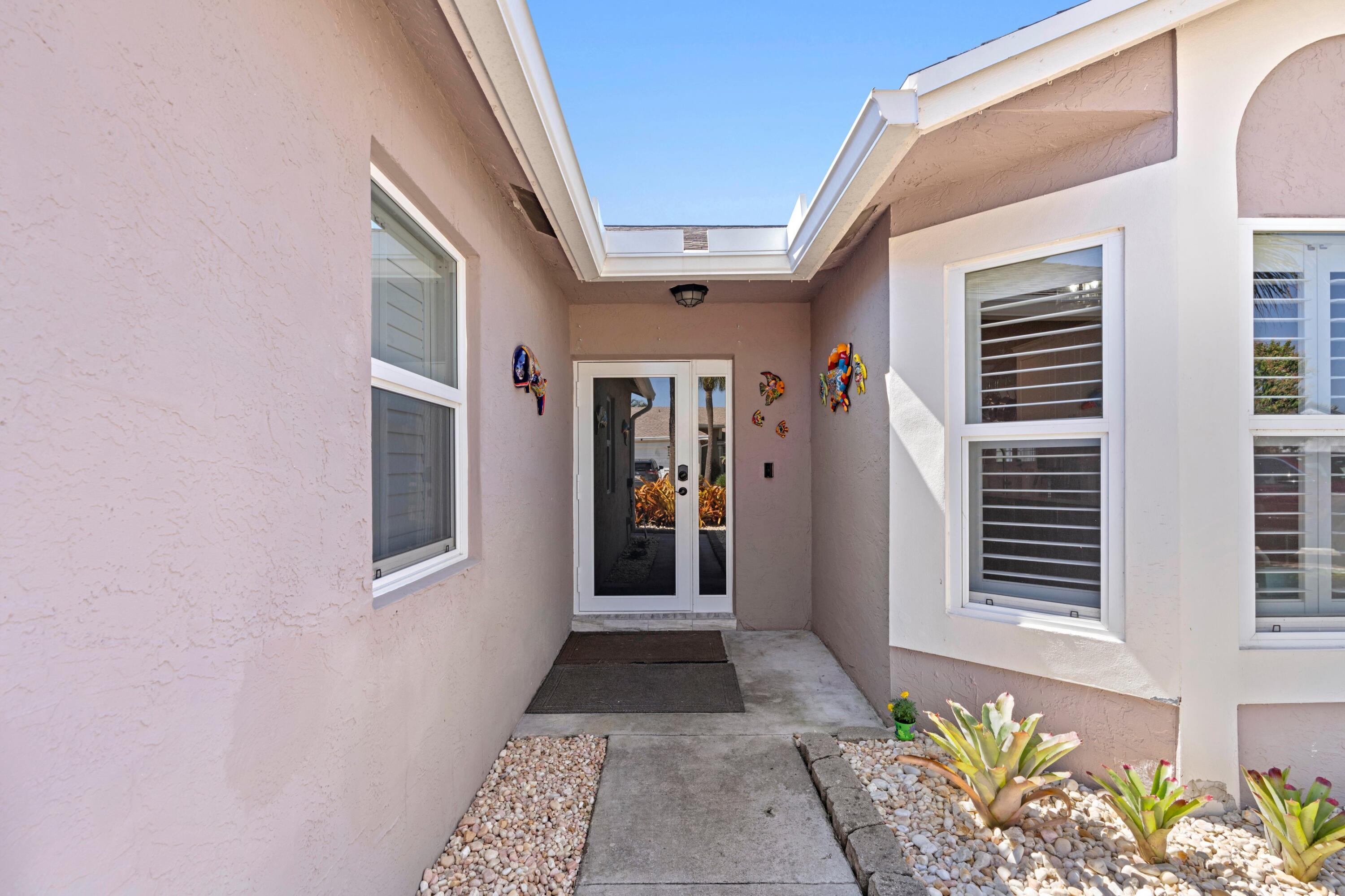 8584 Shawe Way Boca Raton, FL 33433 - Photo 21 of 43 a view of a entryway of a house