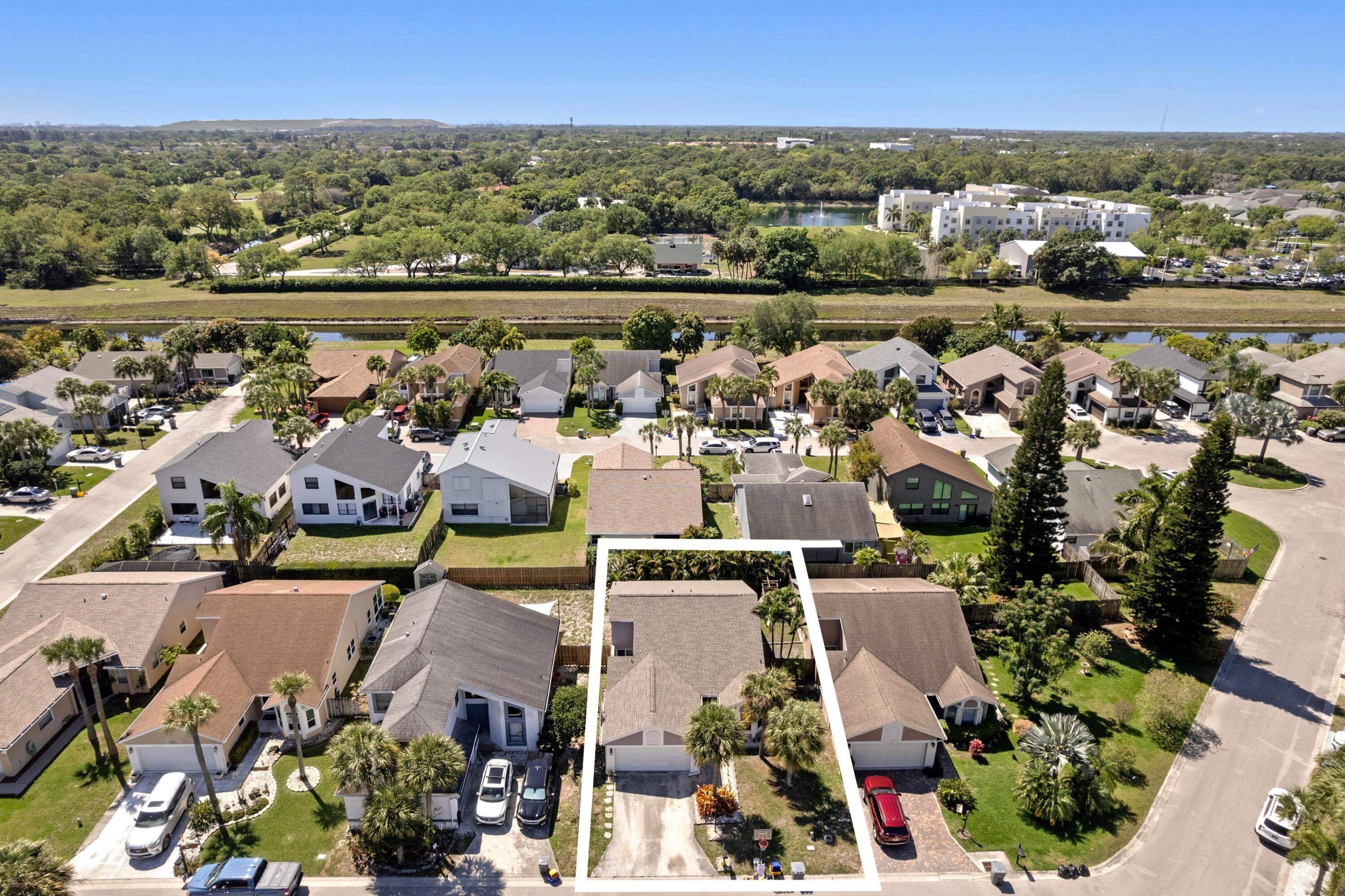 8584 Shawe Way Boca Raton, FL 33433 - Photo 29 of 43 an aerial view of a city