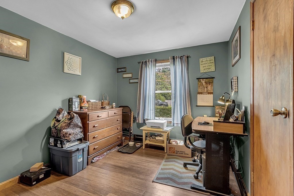 173 Memory Lane Orange, MA 01364 - Photo 17 of 28 a room with furniture and a window
