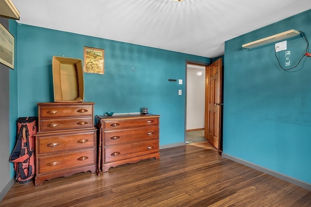 173 Memory Lane Orange, MA 01364 - Photo 19 of 28 a view of a dresser with wooden floor