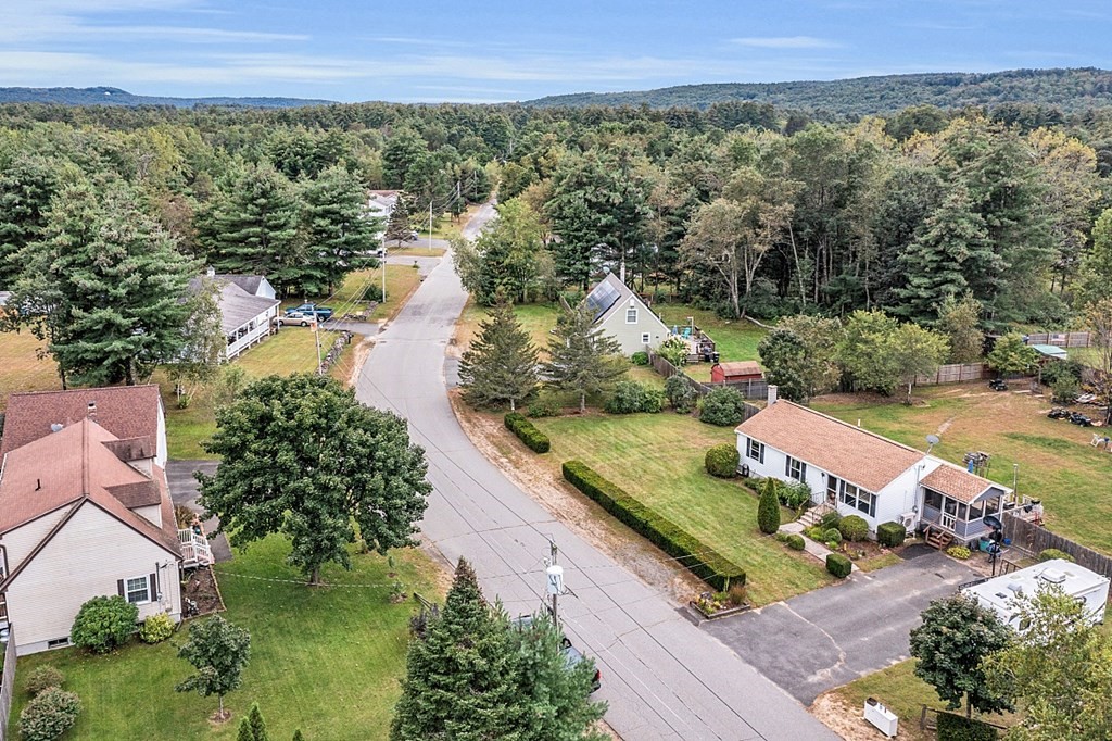 173 Memory Lane Orange, MA 01364 - Photo 28 of 28 an aerial view of a house with a garden