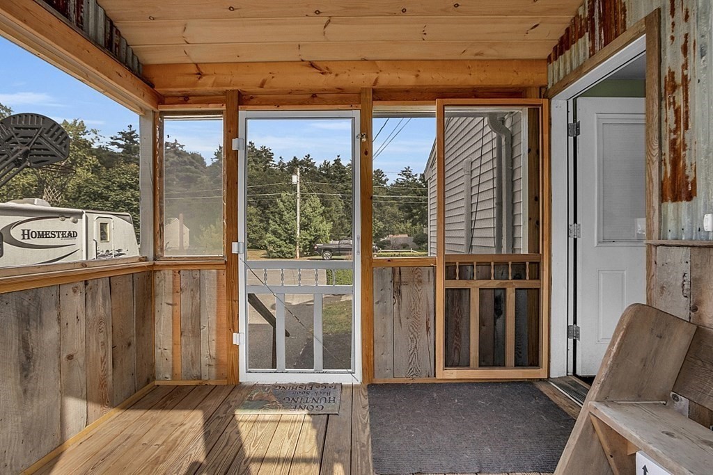 173 Memory Lane Orange, MA 01364 - Photo 10 of 28 a view of a balcony with furniture and front door