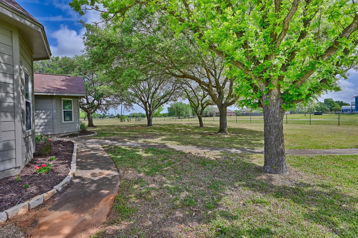 4988 Thane Road Navasota, TX 77868 - Photo 6 of 50 Left Side of House and Yard