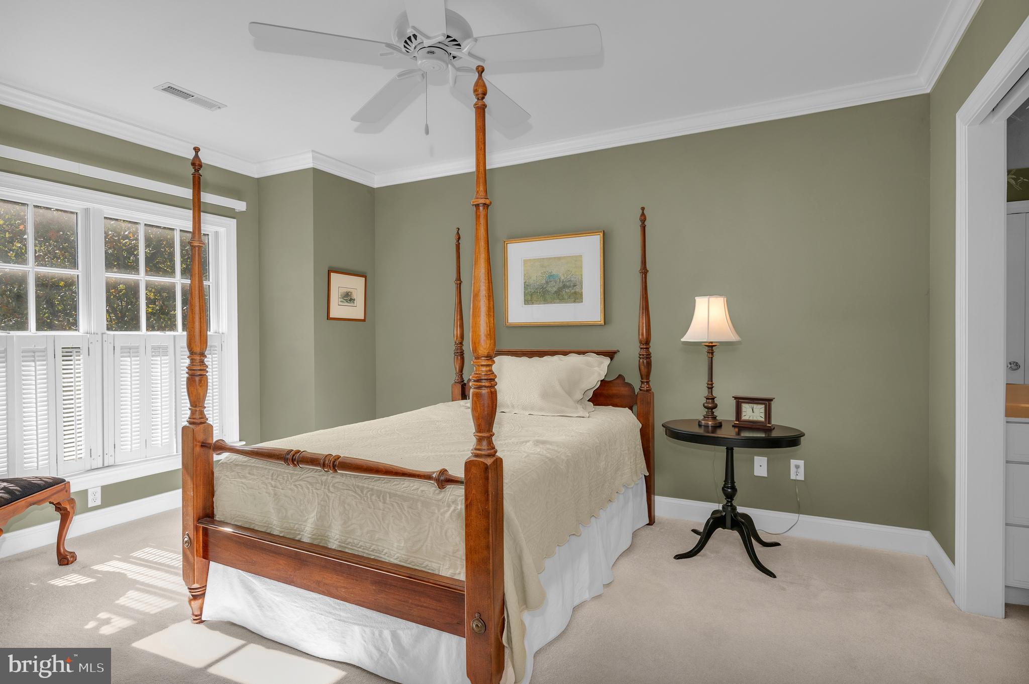 28872 Jasper Lane Easton, MD 21601 - Photo 25 of 38 a bedroom with a bed and a table