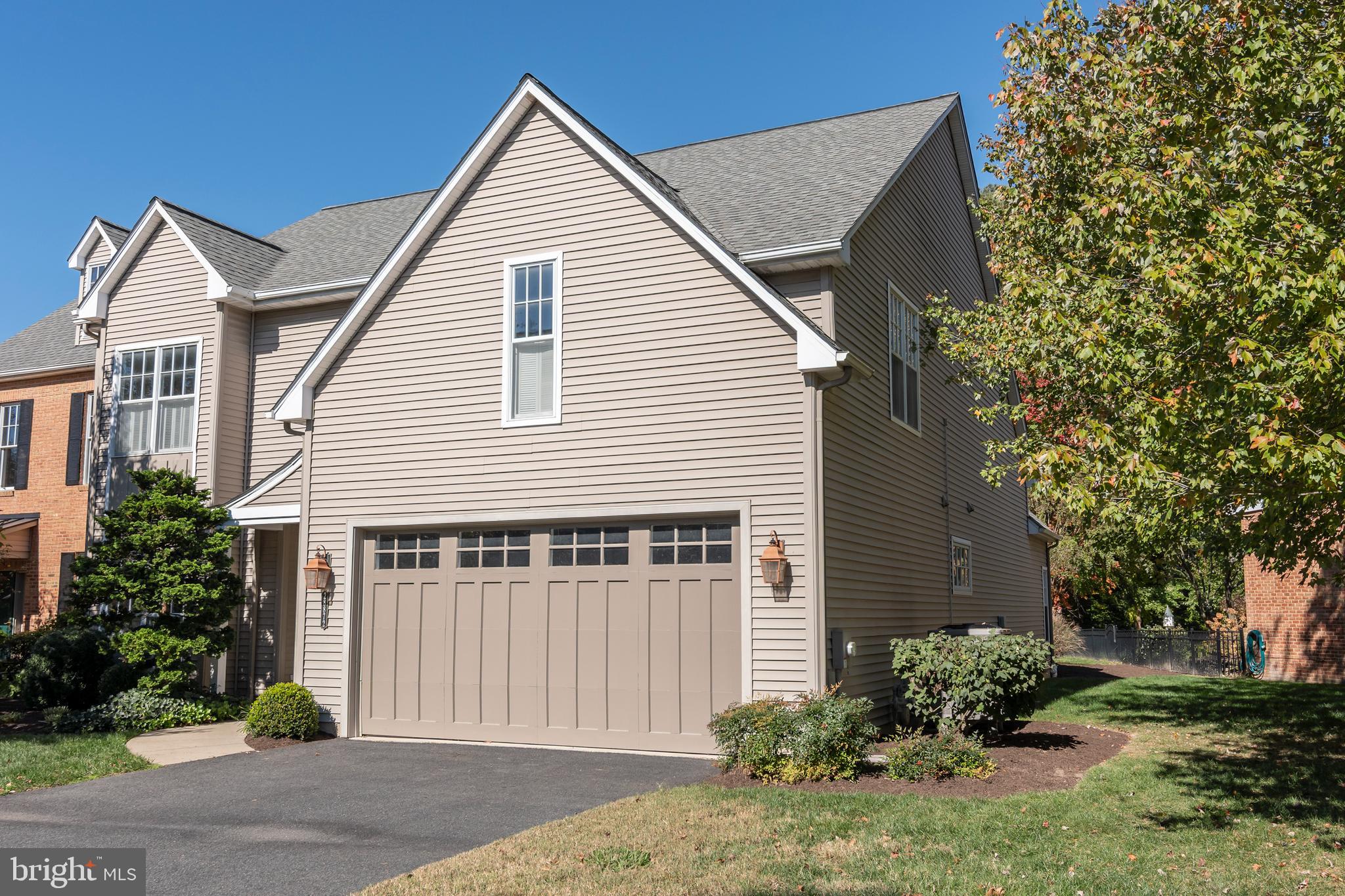 28872 Jasper Lane Easton, MD 21601 - Photo 31 of 38 a front view of a house with garden